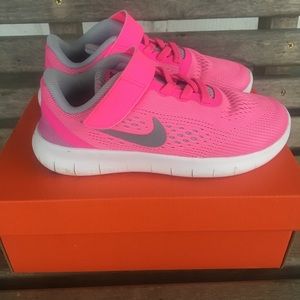 Girls Pink Nike Free RN Tennis shoes size 12C